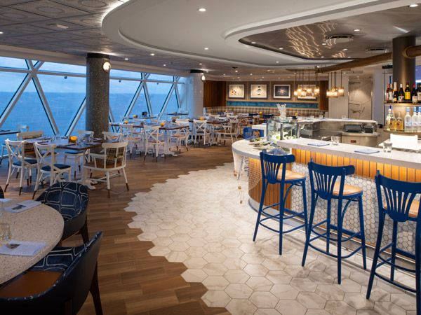 the dining interior at Hooked, the seafood specialty restaurant, Icon of the Seas
