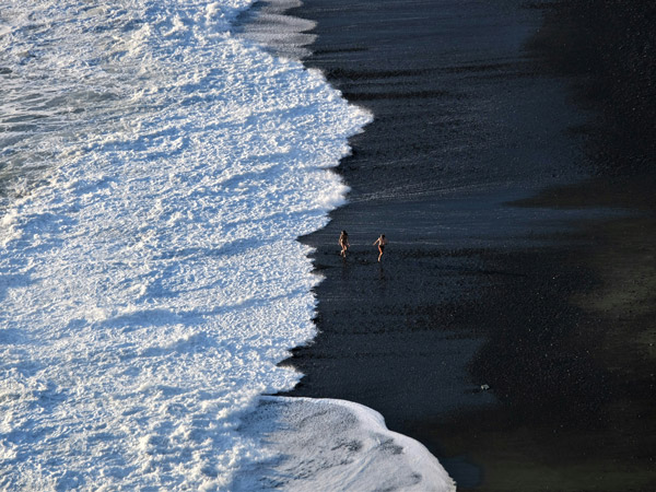 the black sand beach at Nonza, Corsica