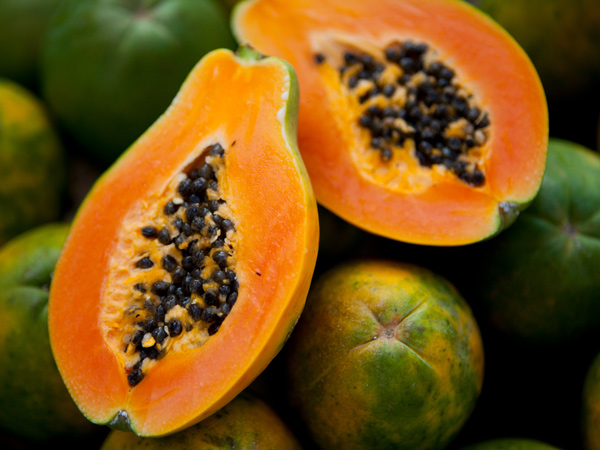 a papaya sliced in half