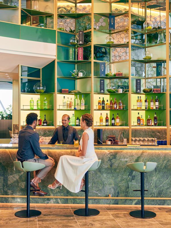 a couple enjoying the cocktail hour at Eden