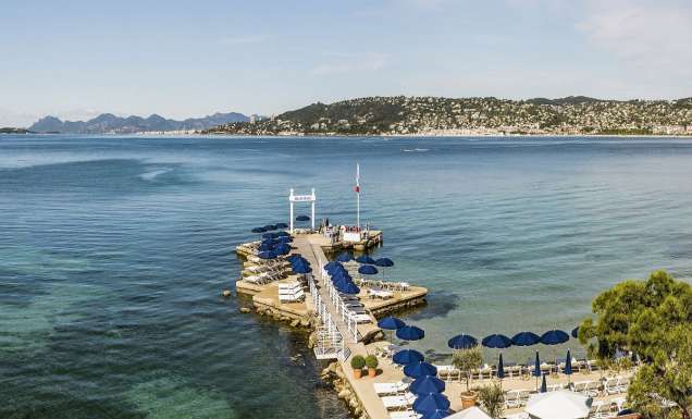 an aerial view of a private beach at Belles Rives