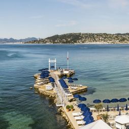 an aerial view of a private beach at Belles Rives