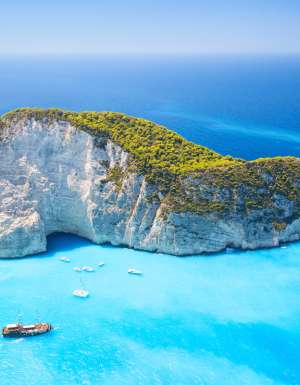 an aerial view of Navagio bay and Ship Wreck beach, Greek Islands