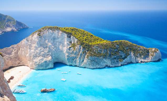 an aerial view of Navagio bay and Ship Wreck beach, Greek Islands