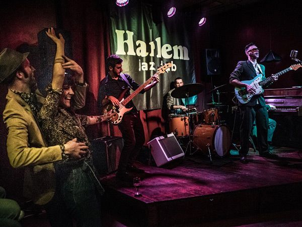 a live band performance at Harlem Jazz Club