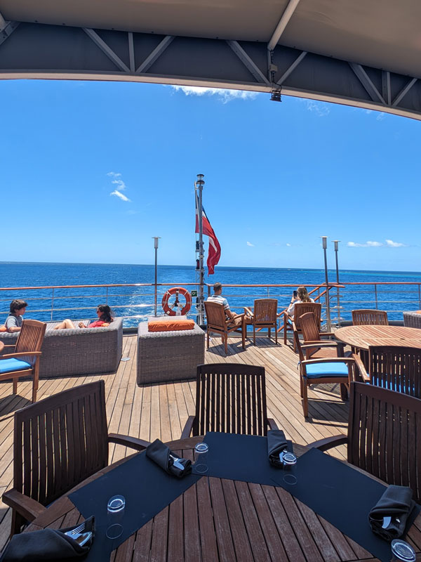 relaxing on the Lido Deck of MS Caledonian Sky