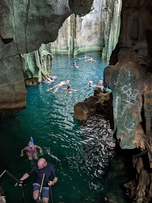 swimming in Sawa-i-Lau Cave