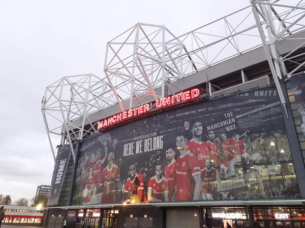 a soccer game at the Old Trafford Stadium, Manchester