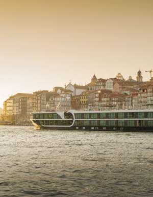 the Avalon Alegria ship cruising along the Douro Valley, Portugal