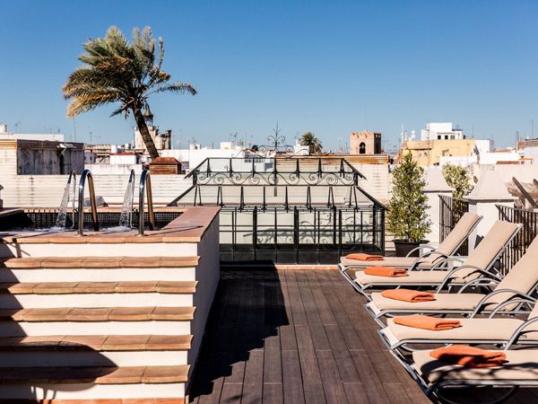 the rooftop pool at Hotel Palacio de Villapanes, Seville