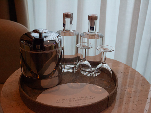 the adjustable table with water and wine glasses, Panorama Suite, Avalon Alegria