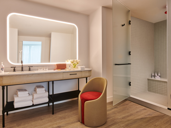 the bedroom suite with bathroom in the Chamber King room, Virgin Hotels NYC