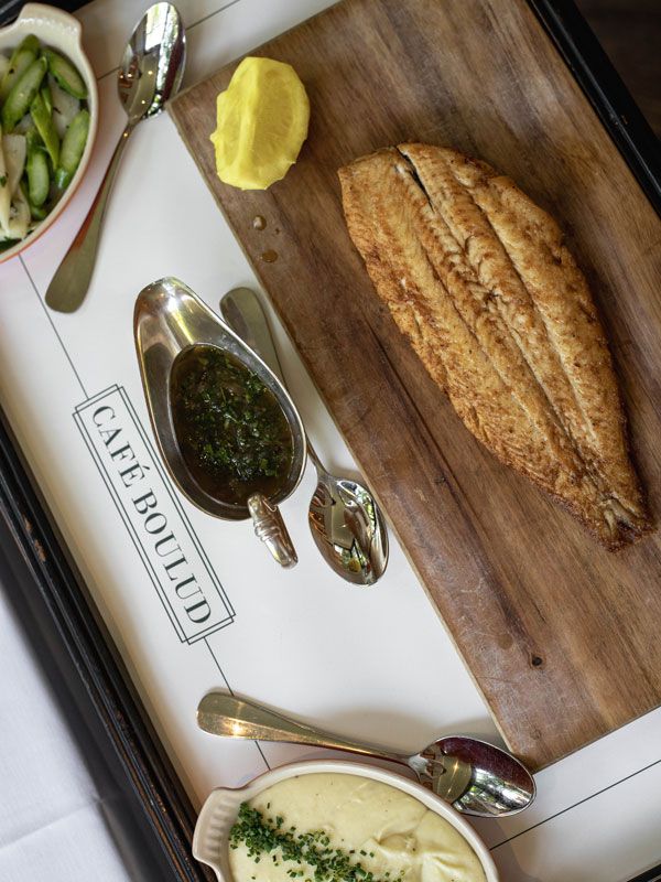a table-top view of a Dover Sole dish at Cafe Boulud, Palm Beach