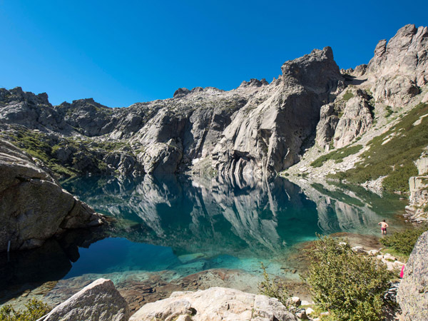 a scenic view of the Capitello Lake, Corsica