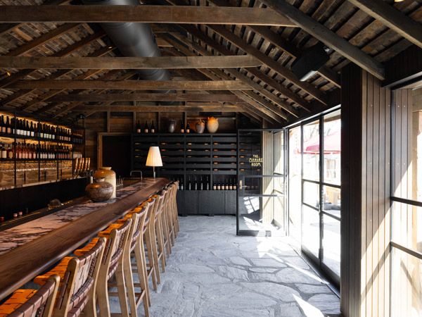the rustic dining interior of The Manure Room, Ayrburn, New Zealand