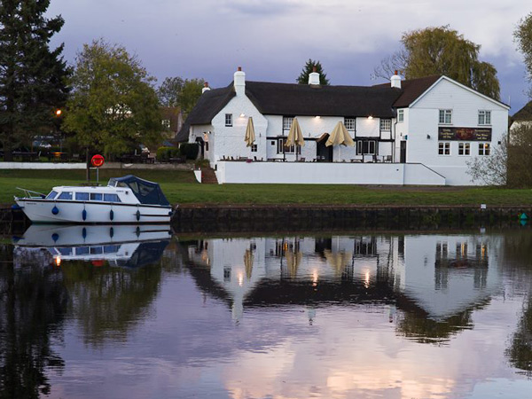 The Old Ferry Boat Inn, Holywell exterior across the water