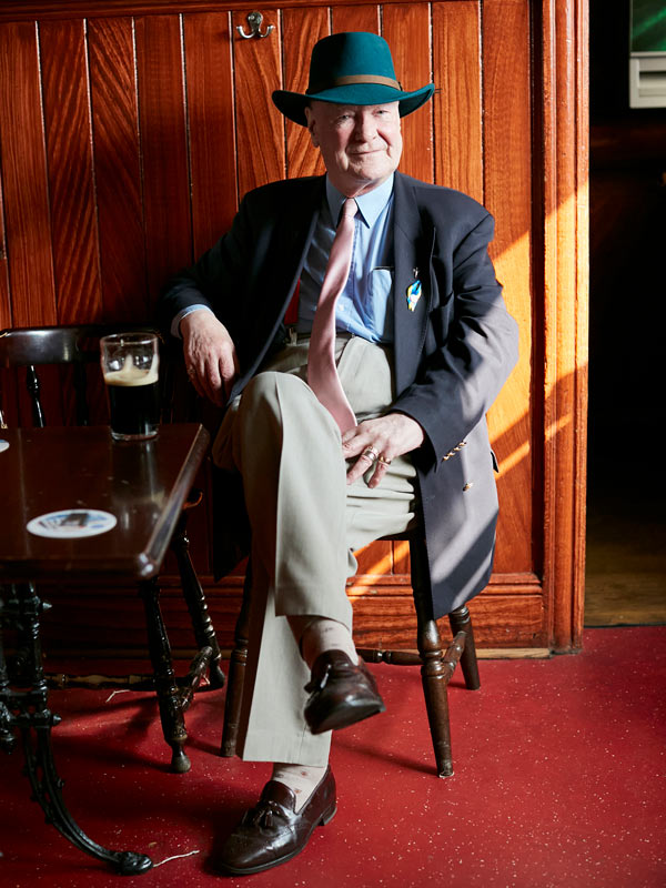 patron drinking inside mulligan's dublin pubs