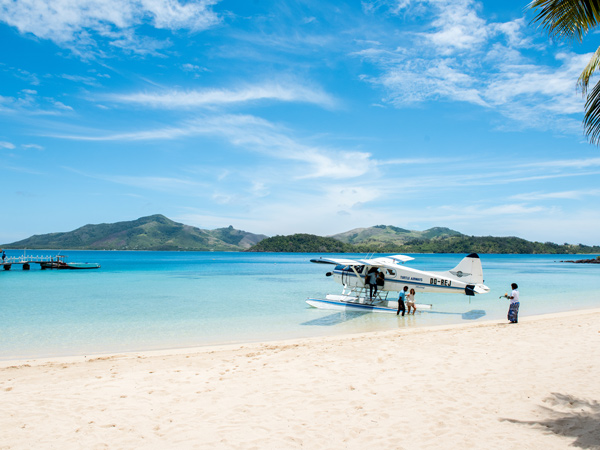a seaplane arriving on Turtle Island, Fiji