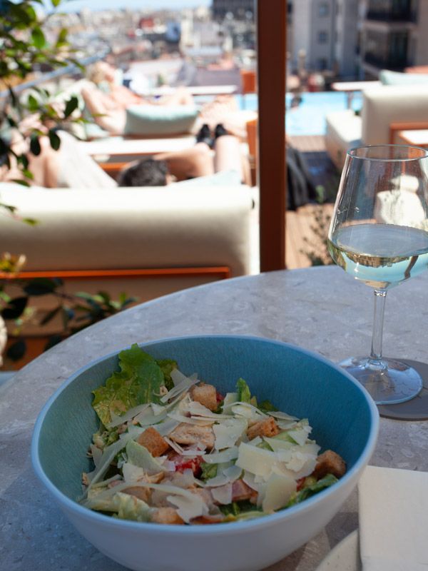 a bowl of food with drink on the table at Grand Hotel Central Barcelona