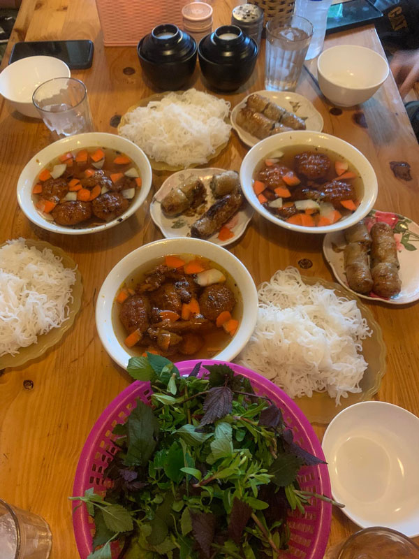 a table-top view of Vietnamese cuisine at Bun Cha Ta Hanoi