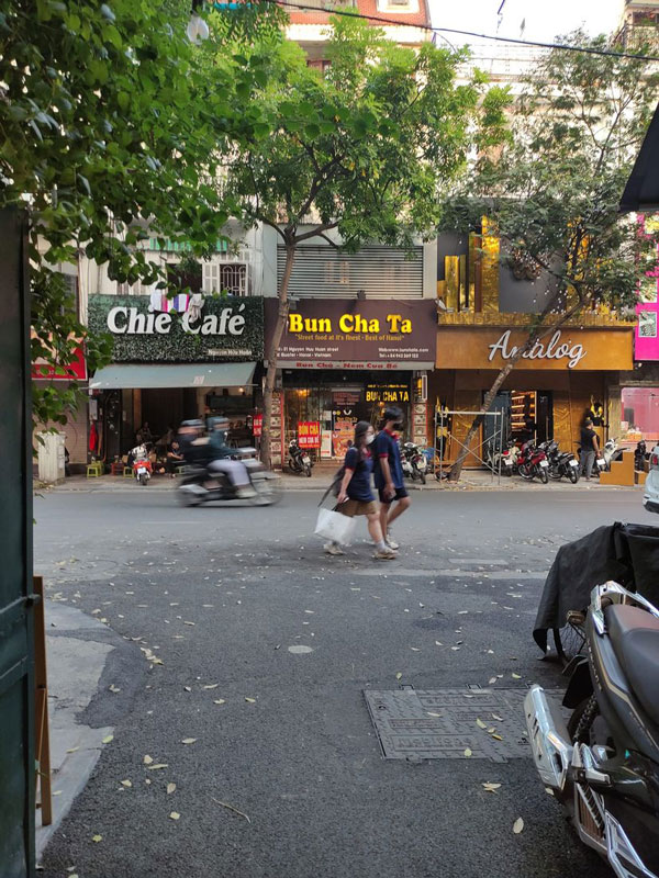 the roadside view and exterior of Bun Cha Ta Hanoi