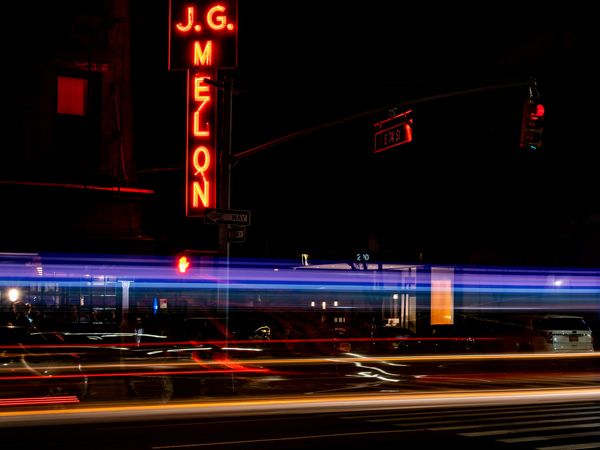 neon lights and signage at JG Melon, New York City, USA
