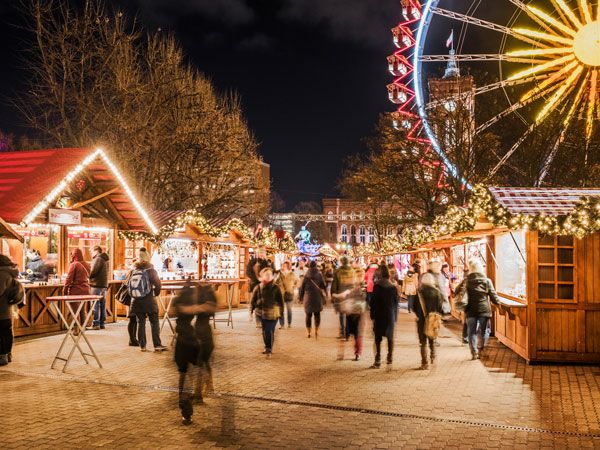 crowds at a Christmas market in Europe
