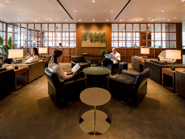 people sitting inside The Deck, Cathay Pacific Business lounge