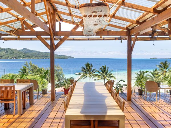 Tables overlooking ocean at Pension Anahata on Taha’a , Tahiti