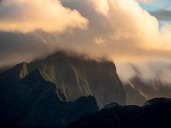 Sunset over mountains Taha’a, Tahiti