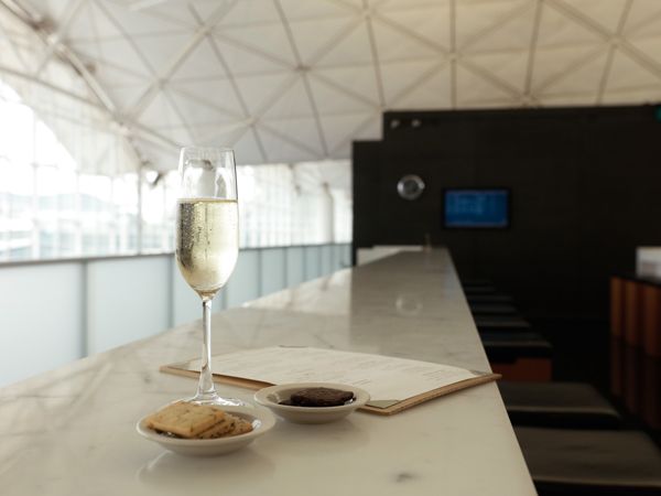 a glass of Champagne available at The Wing, Cathay Pacific Business lounge