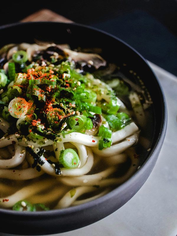 a close-up shot of udon noodles