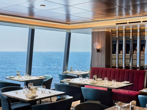 the dining interior with floor-to-ceiling glass windows at Emporium Marketplace
