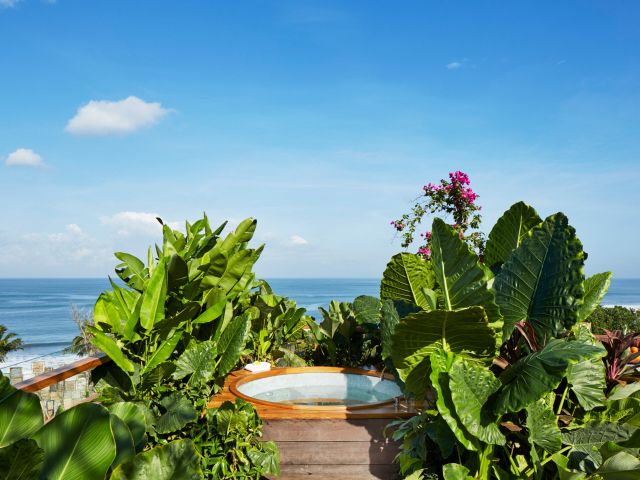 a rooftop garden jacuzzi at Desa Potato Head Bali