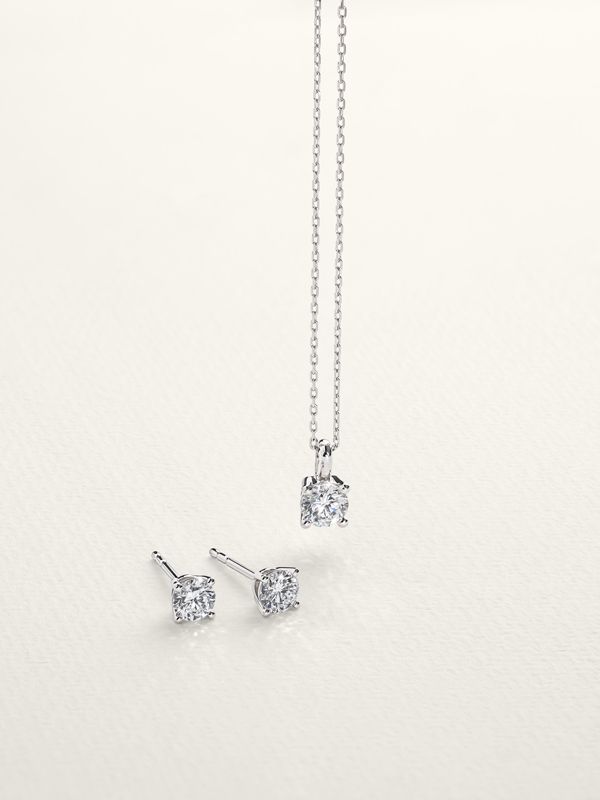 A beautiful diamond necklace and pair of earrings.