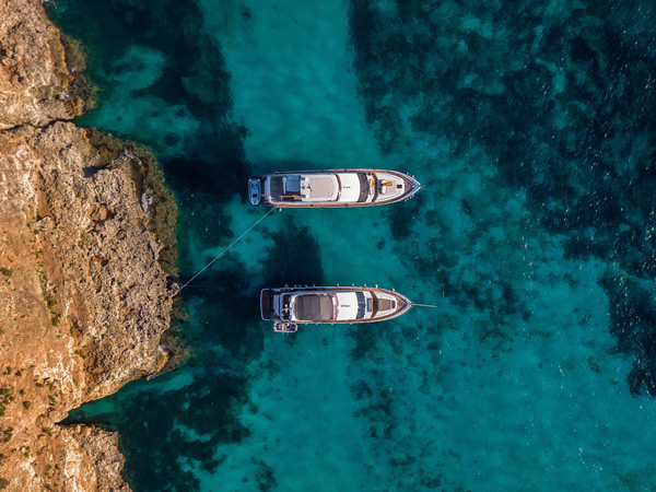 boats moored at Blue Lagoon, Comino, Malta