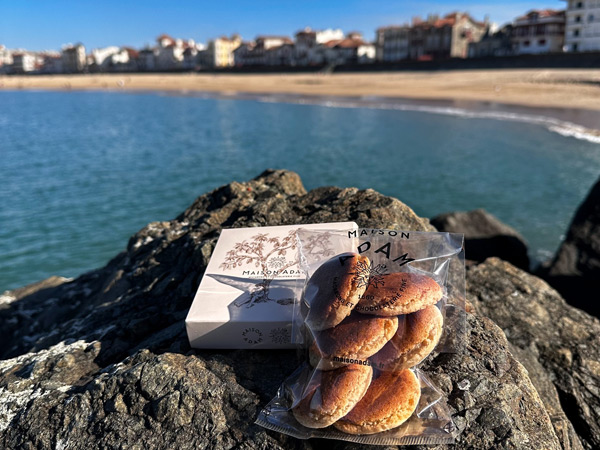 Maison Adam sweet treats against the backdrop of the ocean in Biarritz