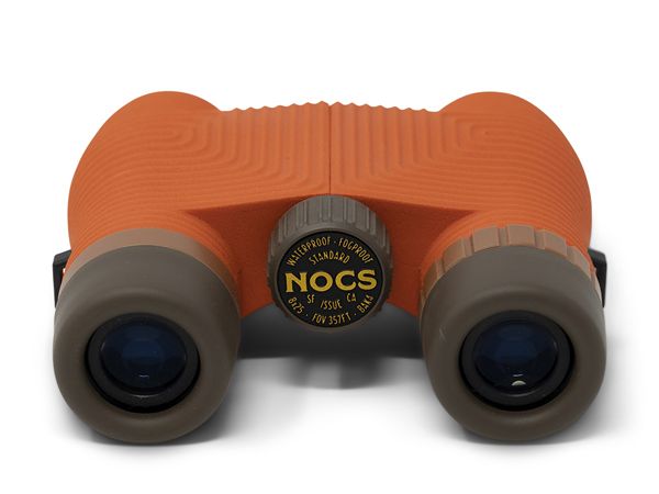 The Nocs Provisions 8 x 25 waterproof binocular in orange.