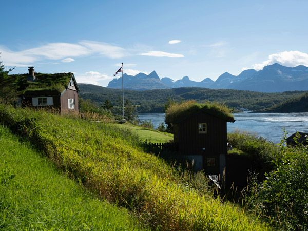 a house on a hill by a lake in Saltstraumen, Bodø, Norway