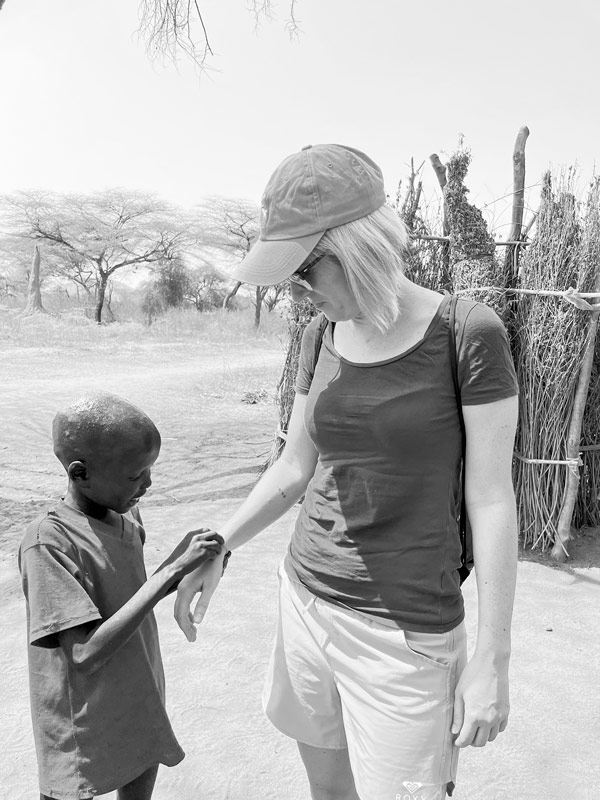 Crooked Compass's Lisa Pagotto interacting with a little boy in South Sudan