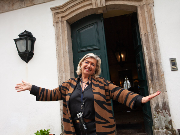 Maria Manuel Cyrne happily welcoming visitors to her home