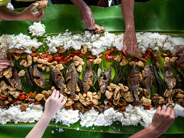 people eating rice in the philippines