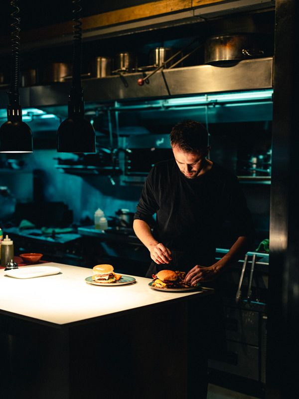 a chef prepping meals at Gastown’s Pourhouse
