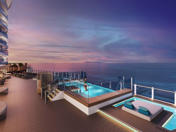 a woman relaxing in the Infinity Beach pool area, NCL Viva
