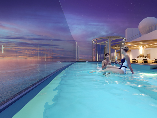 a couple enjoying drinks by the pool at Vibe Beach Club, Norwegian Viva