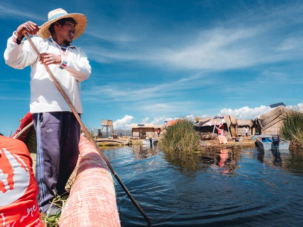 taking a reed boat at Lake Titicaca, Peru