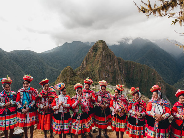 women from Peru’s Sacred Valley at Machu Picchu