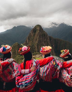 Quechua women from the Sacred Valley with arms linked