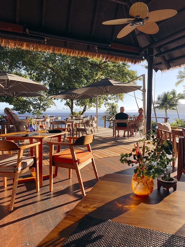 The rich brown interiors of the Banyan Bar &Restaurant glow softly under the sun’s golden light