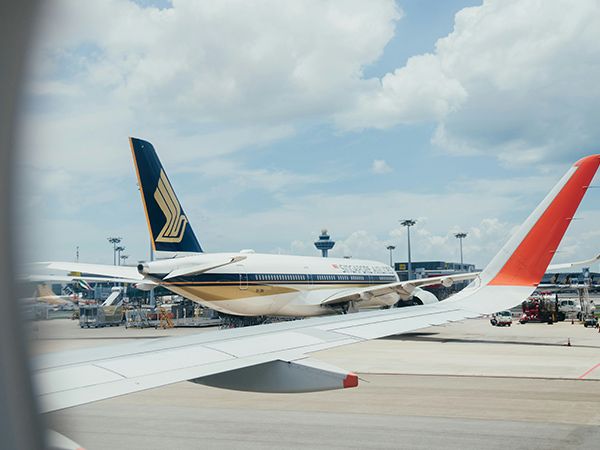 singapore airlines plane out of a passenger window